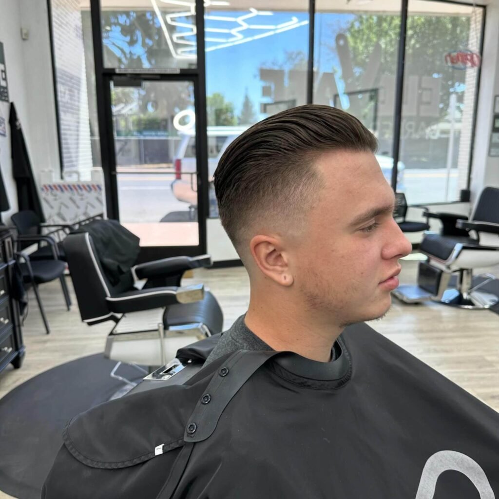 High Fade with Slick Back
