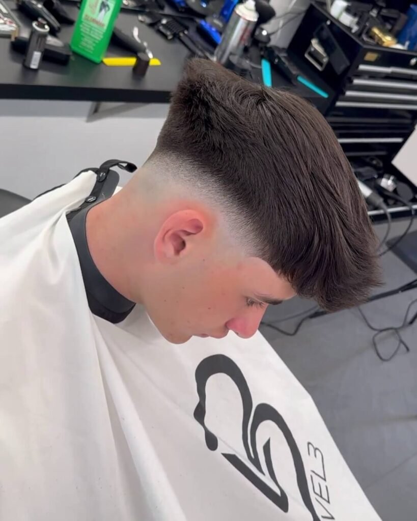 Mid Fade with Quiff Haircut for Men