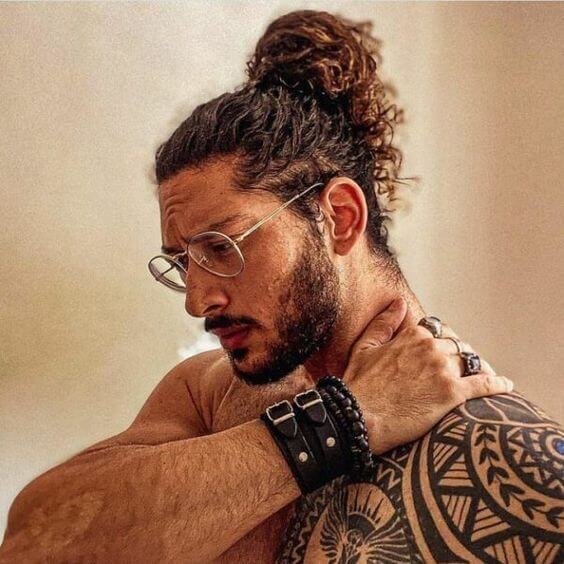 10. Curly Man Bun Hairstyle