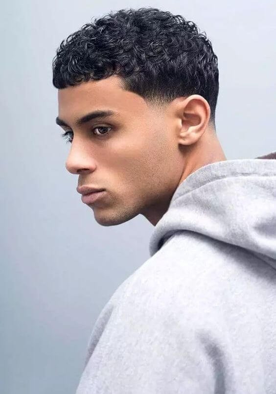 4. Buzz Cut with Natural Curls for Men